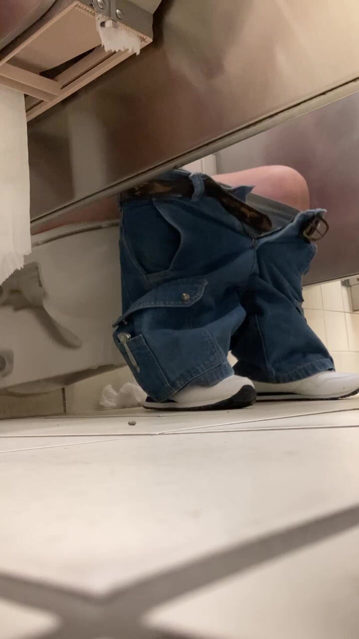 Gassy older guy lets out some wet poop at the store