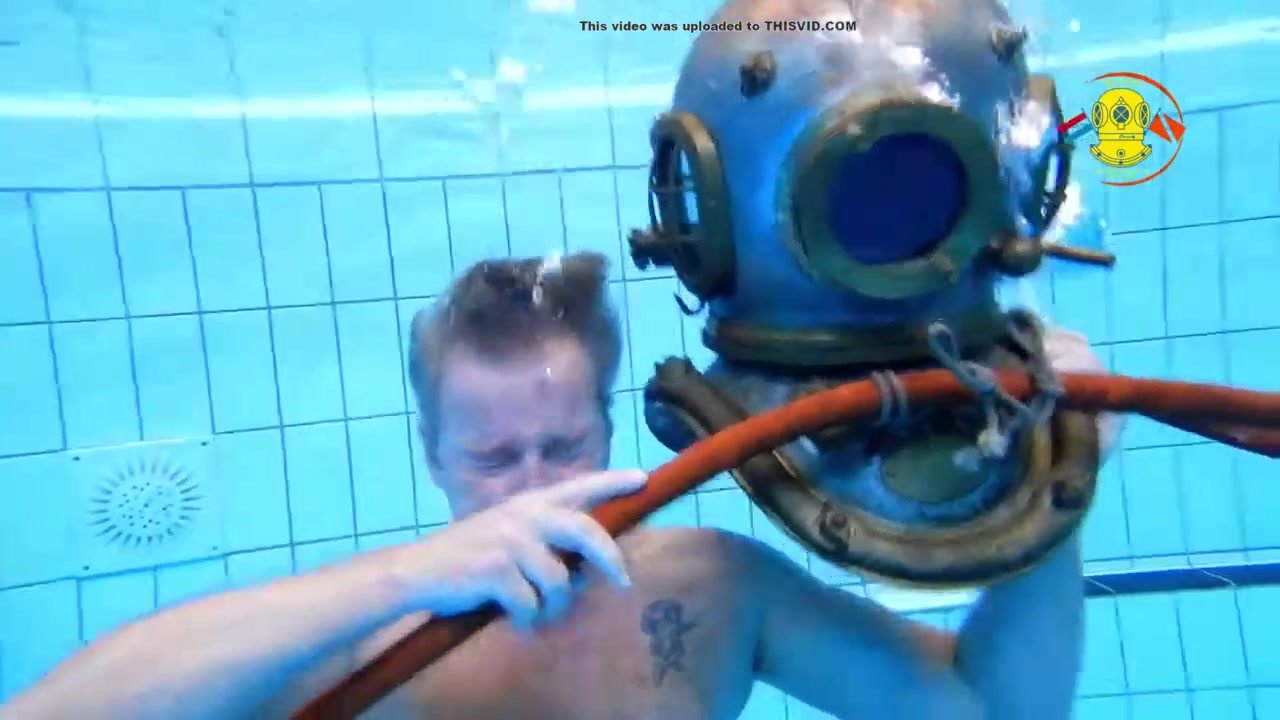 Dutch cute helmet diver barefaced underwater