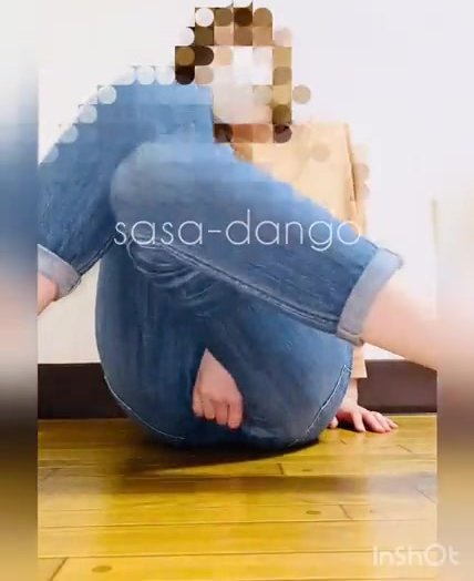 Japanese girl desperately wets her pants on the floor
