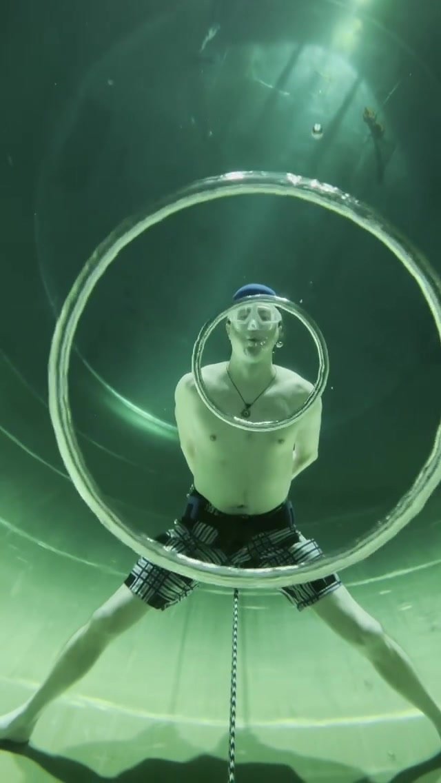 Russian blowing air rings underwater
