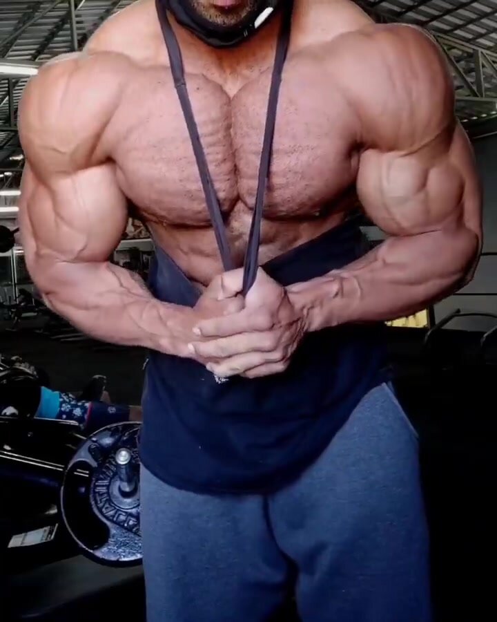 Ripped and shredded muscle flexing