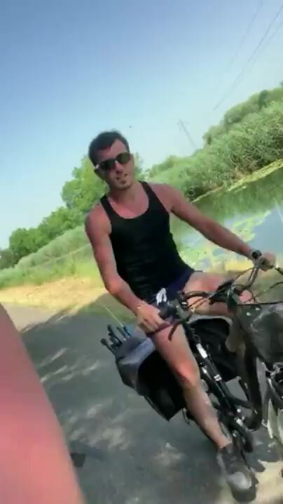 Jerking His Dick On A Bike