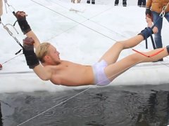 Stretched over a frozen pond naked