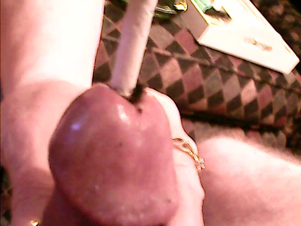 Mistress Gwendolyn burns out my pee hole close up view - video 3