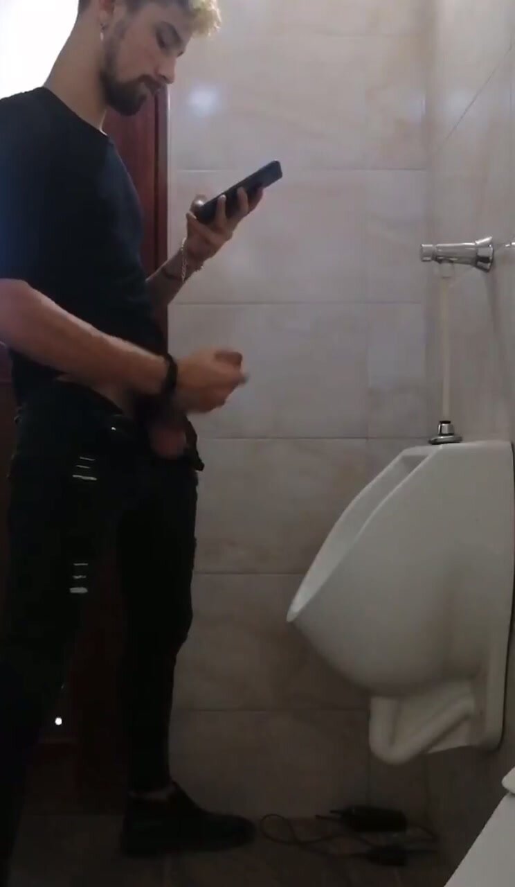 Guy in toilet with huge cock