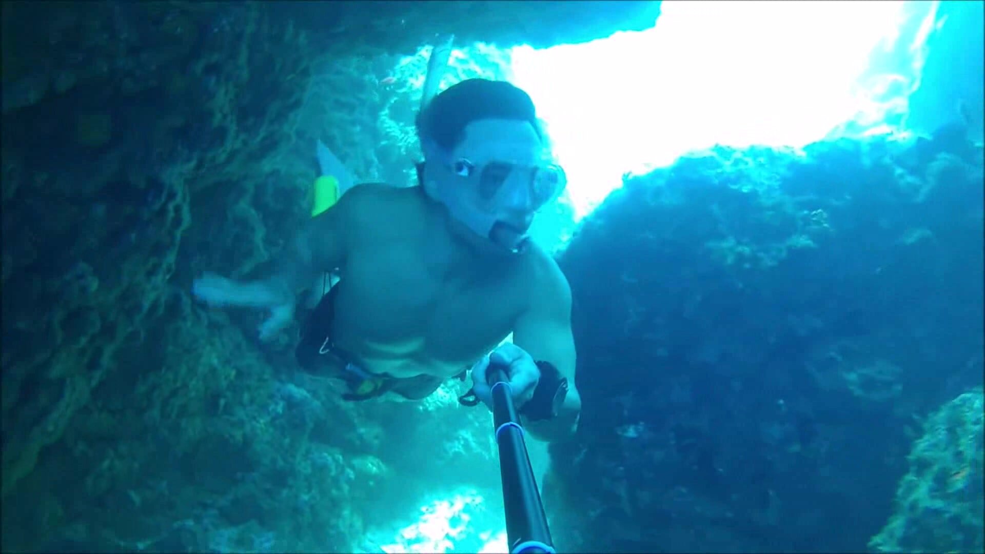 Fit freediver breatholding barechest underwater