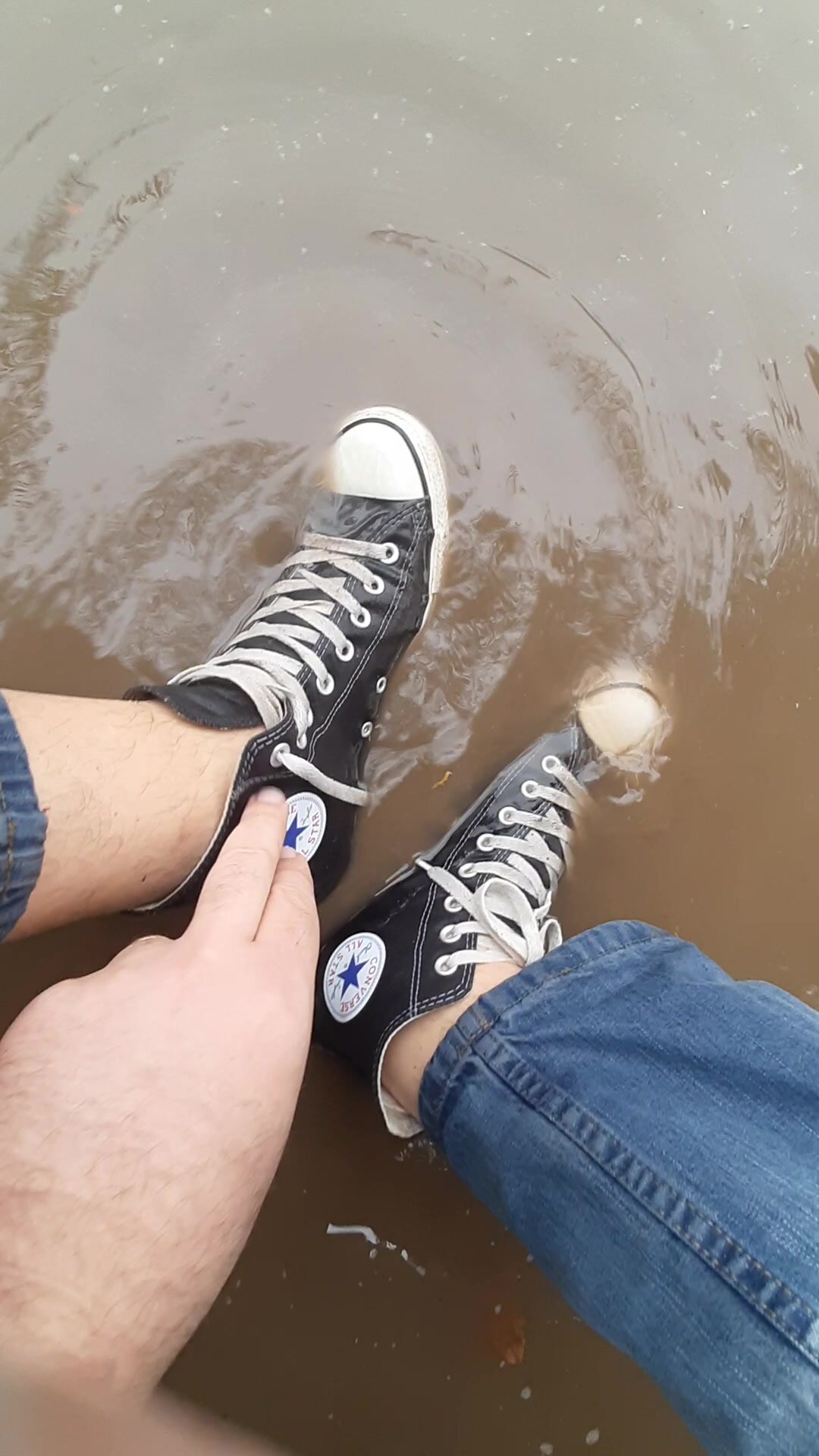 Wet trashed Converse Chucks shoeplay