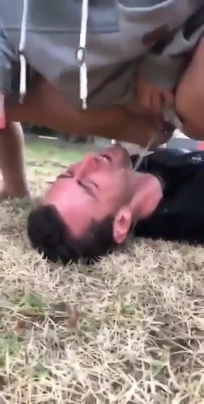 Guy films girl pissing outdoors on BF and in his mouth