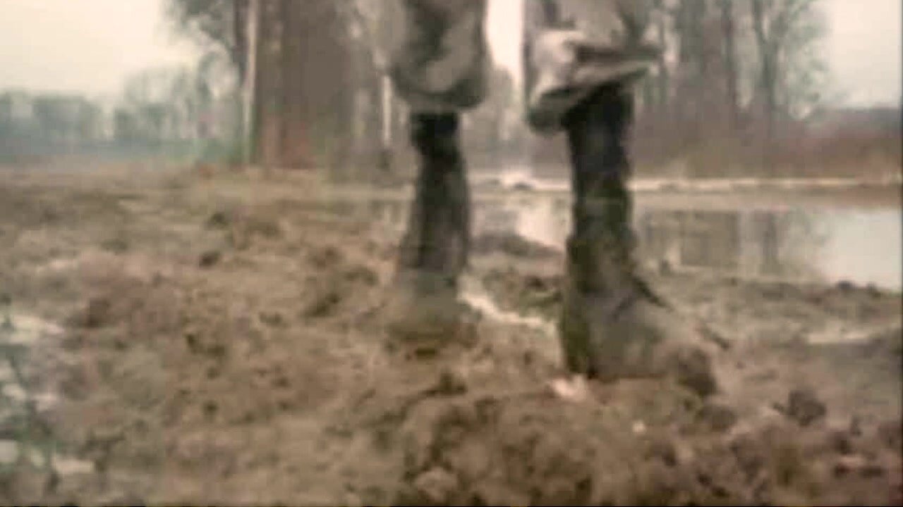 Megabite Boots Stomping in Sloppy Mud
