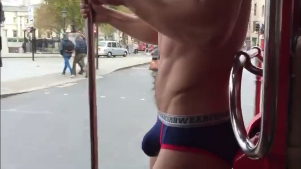 Underwear model photoshoot on London bus