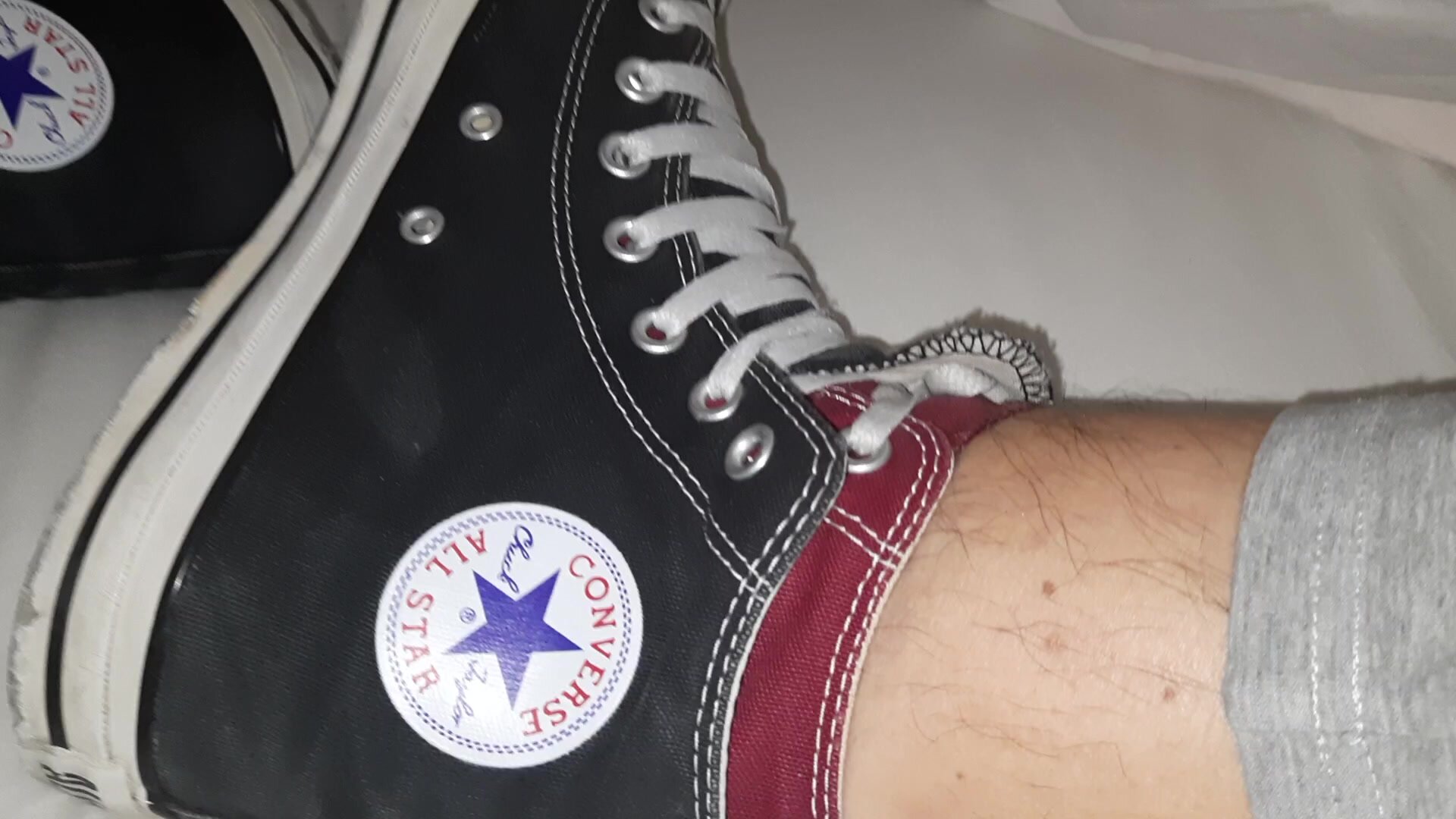 Wearing trashed wife's Converse in my Converse in bed