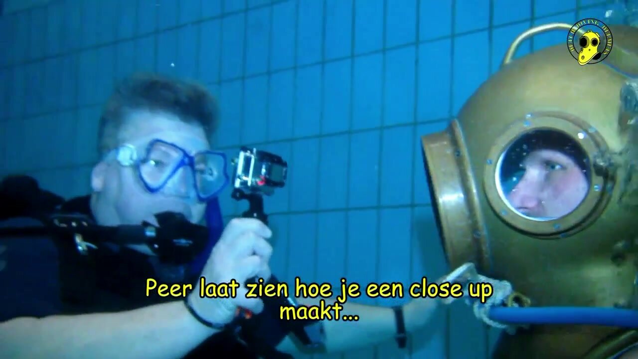 Dutch helmet divers goes barefaced underwater in pool
