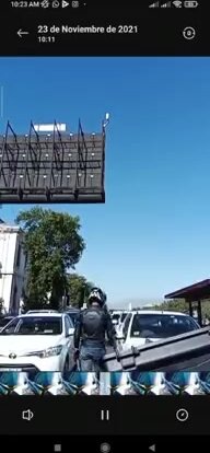 angry biker destroying a car with a chain