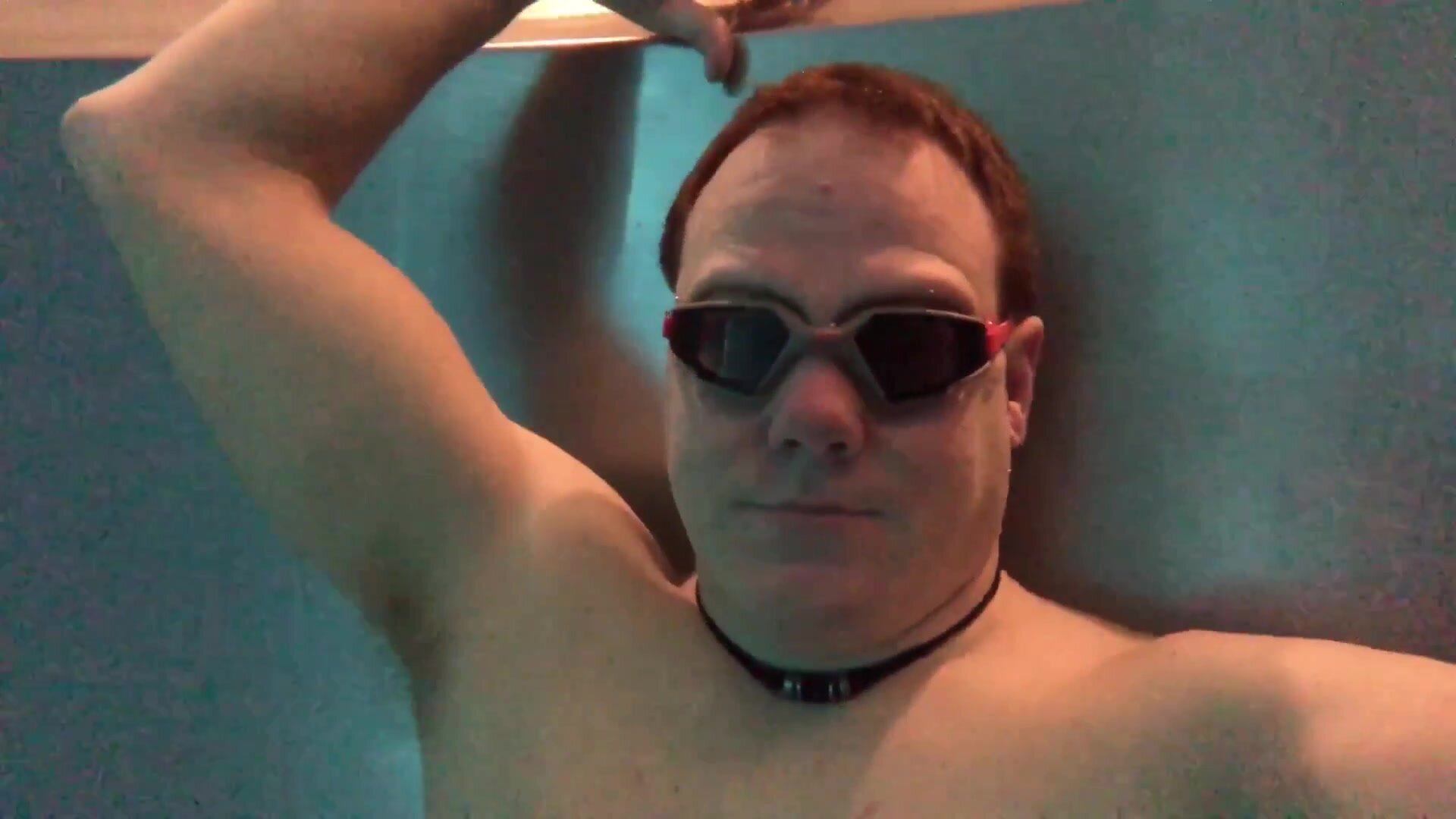 German cutie breatholding underwater in pool