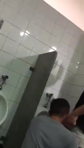 Sucking in Public Bathroom