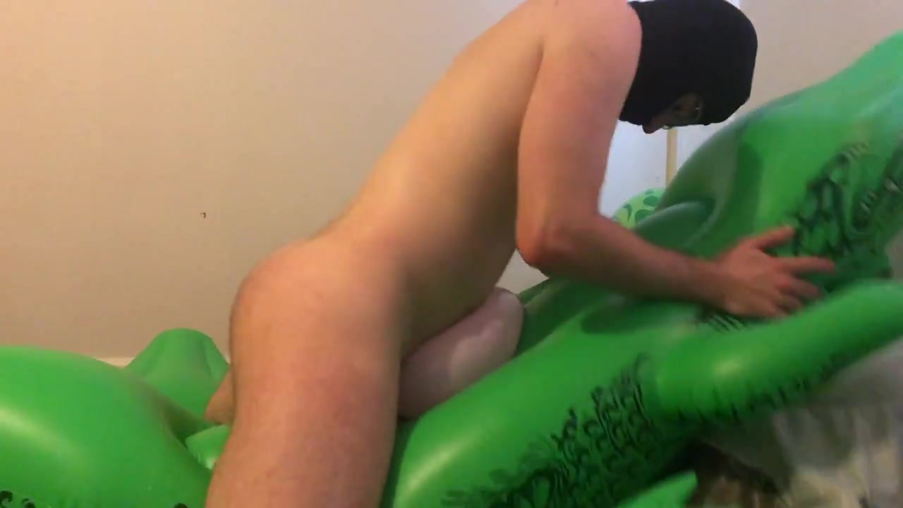 Pounding The Hell Out Of An Inflatable Alligator