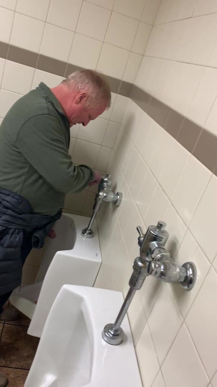 Dad urinal spy