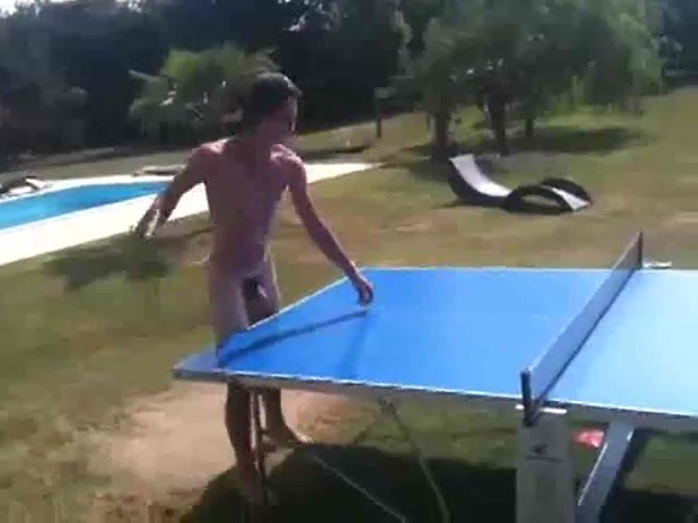 Naked guy playing ping pong