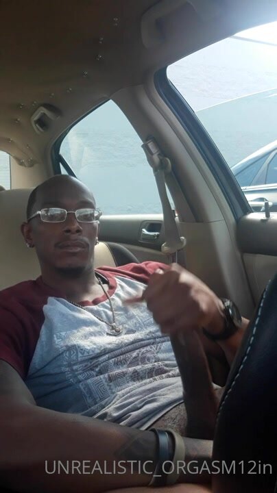 Hung black guy wanking in his car