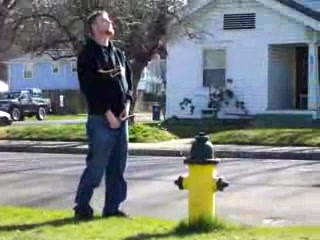 guy pisses on hydrant