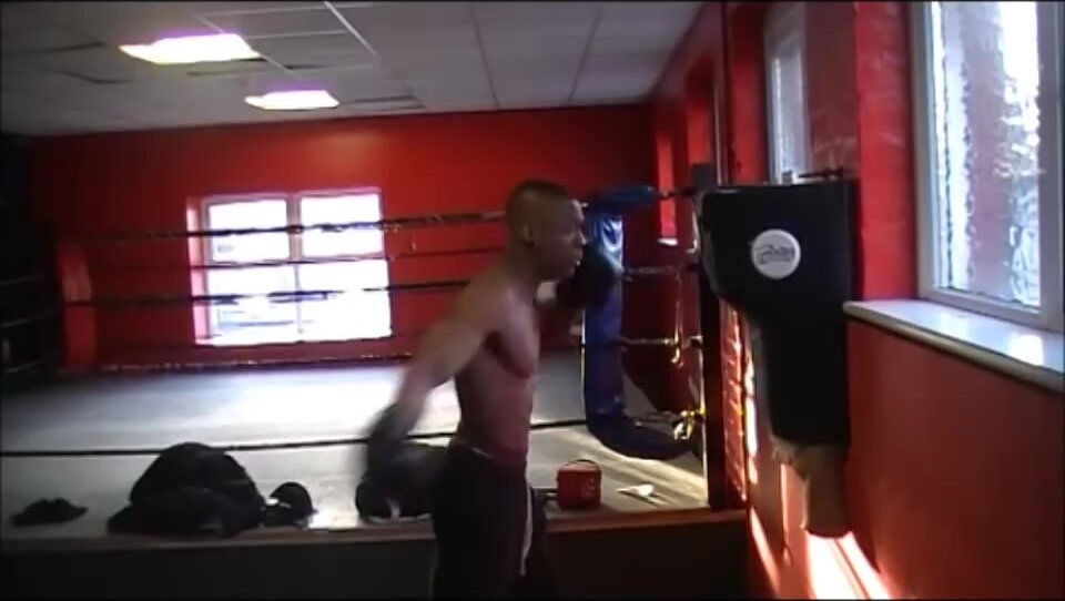Young Black Man Destroys Punching Bags