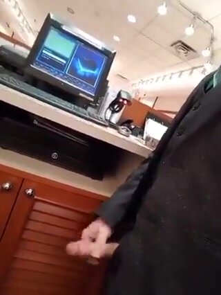 Cumming at the store while working