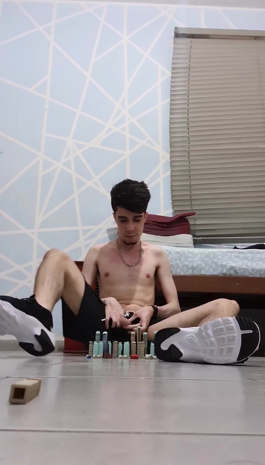 Giant Nike boy found a tiny city in his room
