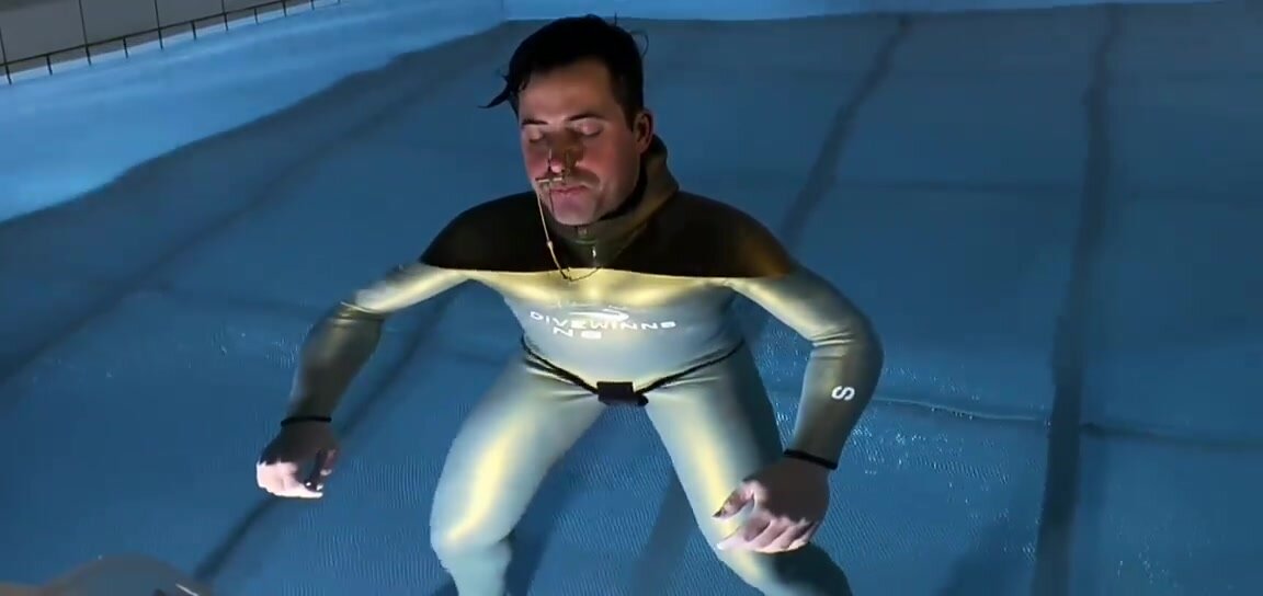 Wetsuit freediver speeded up underwater breathold