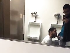 Two hot guys enjoy a nice suck in a resroom