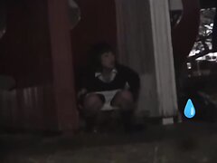 Girl peeing on the street - video 2