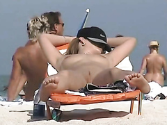 Lots of shaved pussies on the beach