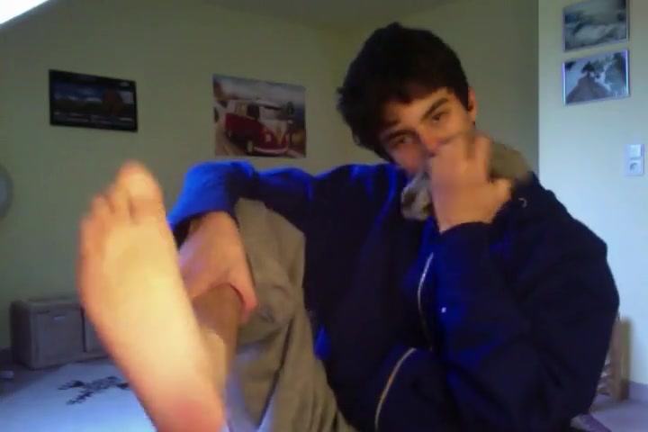 Smelling his foot