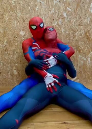 Spidermen cuddling