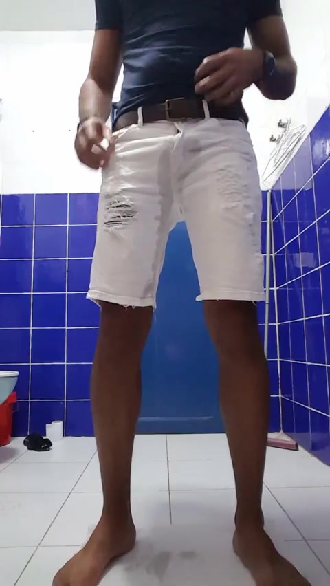LETTING THE PISS FLOW IN HIS SHORTS