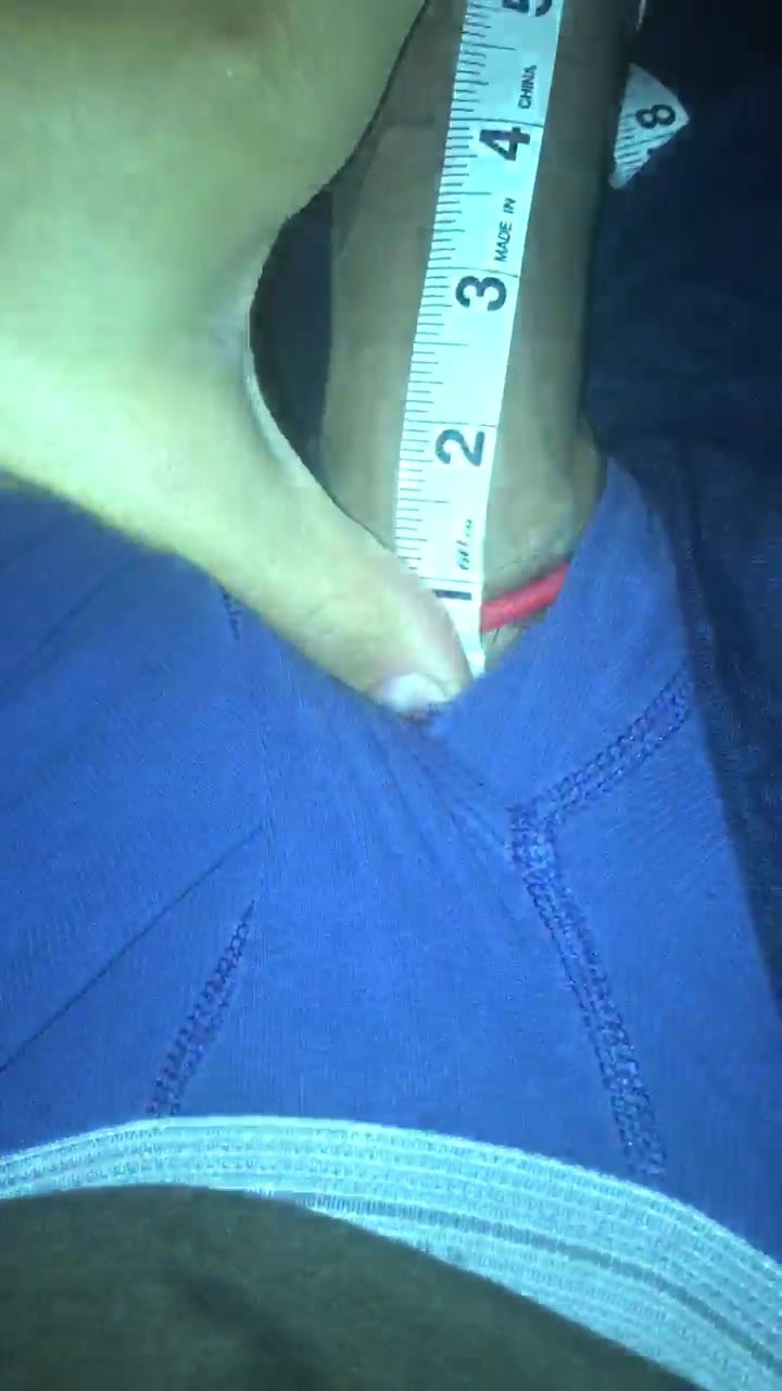 Twink measuring huge dick