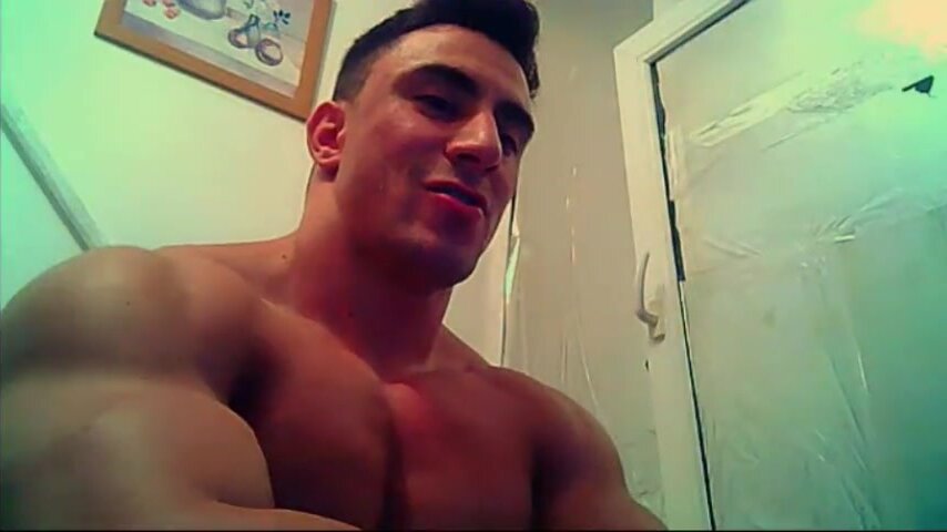 Hunky performer fakes cum