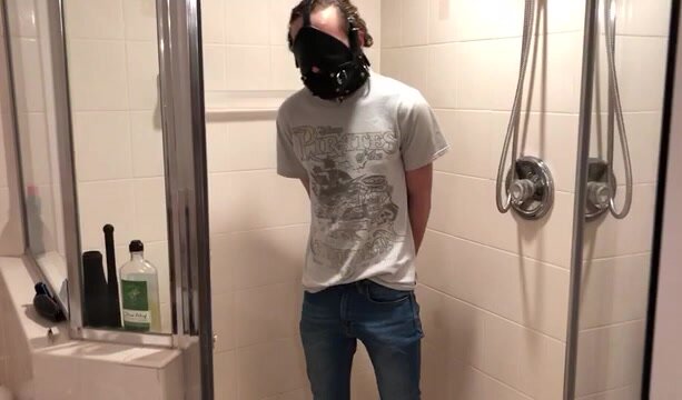 muzzled and locked  in jeans till he pisses himself