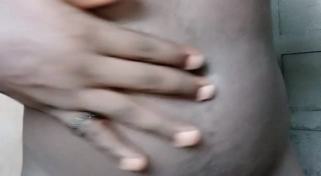 Black guy showing deep belly button