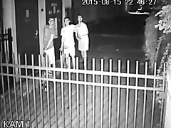 three boys pissing behind pub