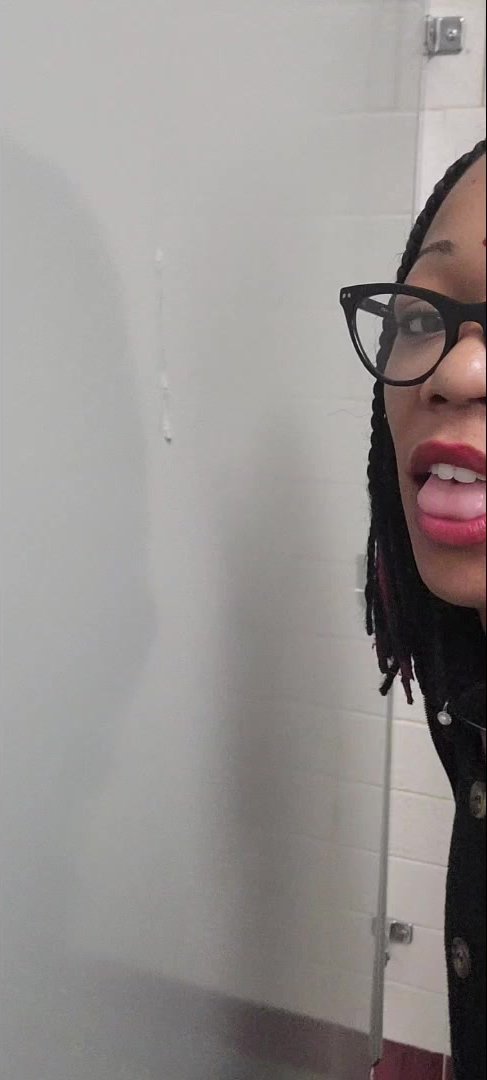 Dirty black milf slurps puke off public bathroom floor