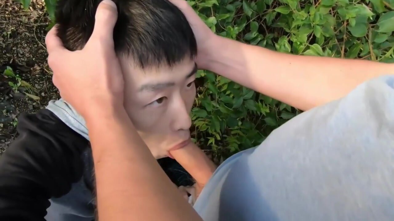Feeding his Asian sub boy in the park