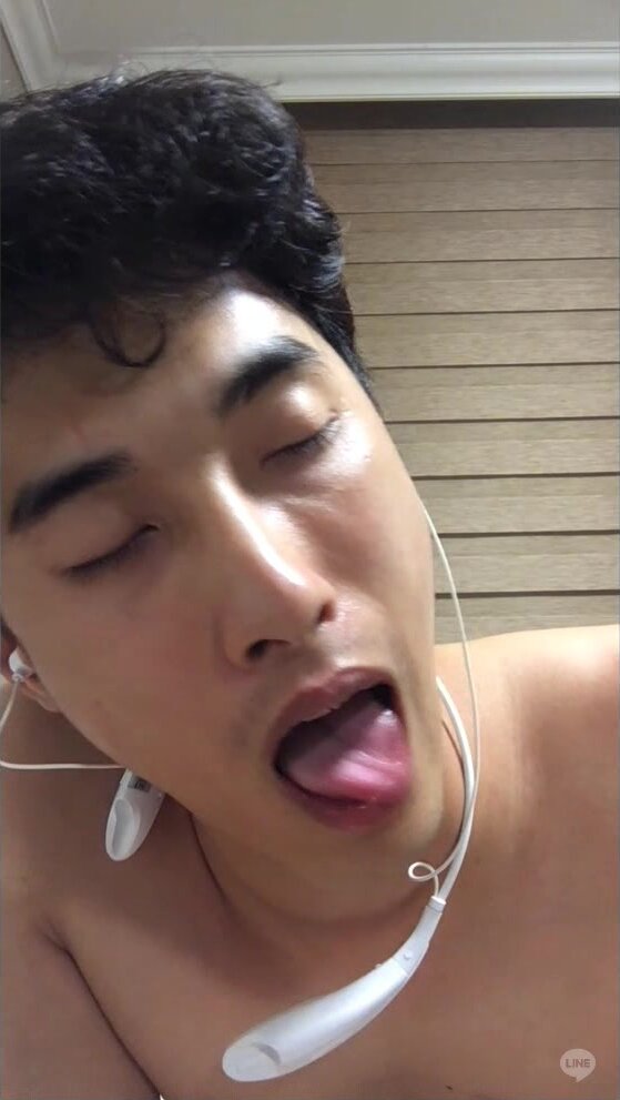 Korean guy in office wear wanking