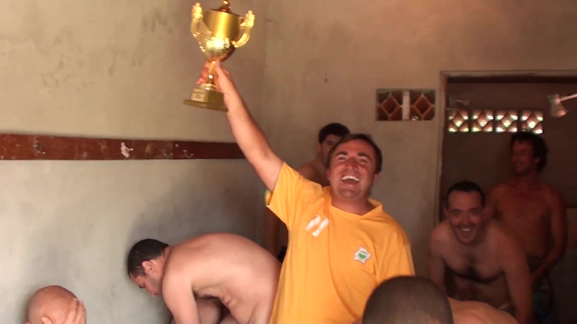 Amateur team players celebrate (naked)
