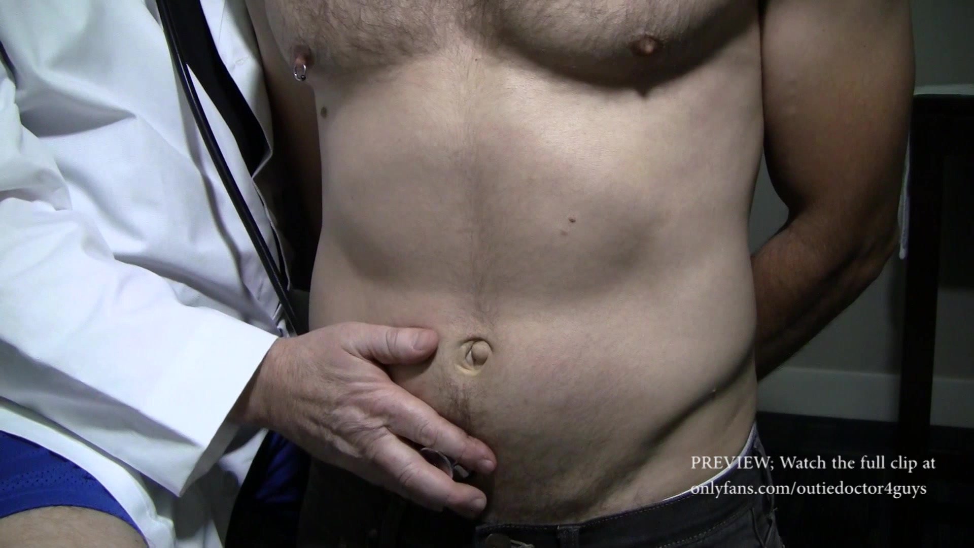 outie bellybutton stud examined