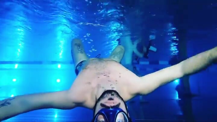 Blowing bubbles underwater in pool - video 3