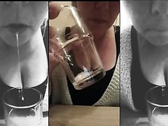 Girl spitting into a glass