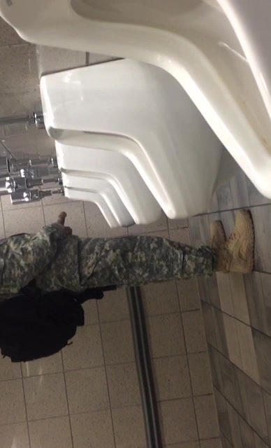 Black soilder cruising in public restroom