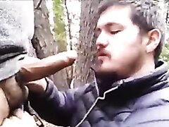 Cubby guy sucks and swallows in the woods