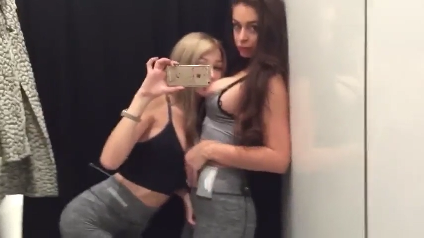 perfect lesbians fucking in a clothing tester