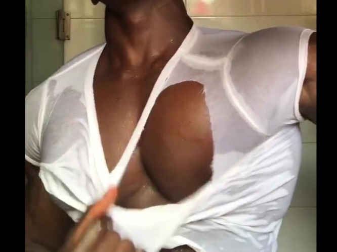 black bodybuilder rips wet tshirt